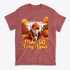 Make Fall Cozy Again Seasonal Shirt featuring a person in a red hat against a colorful autumn backdrop.