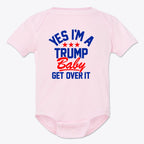Yes I am A Trump Baby Onesie Art in pink with text 'YES I'M A TRUMP Baby GET OVER IT' for patriotic infants.