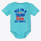 Yes I am A Trump Baby Onesie Art displayed on a turquoise onesie with bold text in red and blue.