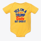 Yes I am A Trump Baby Onesie Art in bright yellow with bold text design featuring patriotic colors.