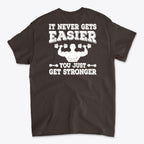 Back Print Never Gets Easier Fit graphic tee featuring a motivational design for fitness enthusiasts.