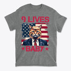 Nine Lives Baby Red Letters Art graphic tee featuring a cat in a suit against an American flag background.