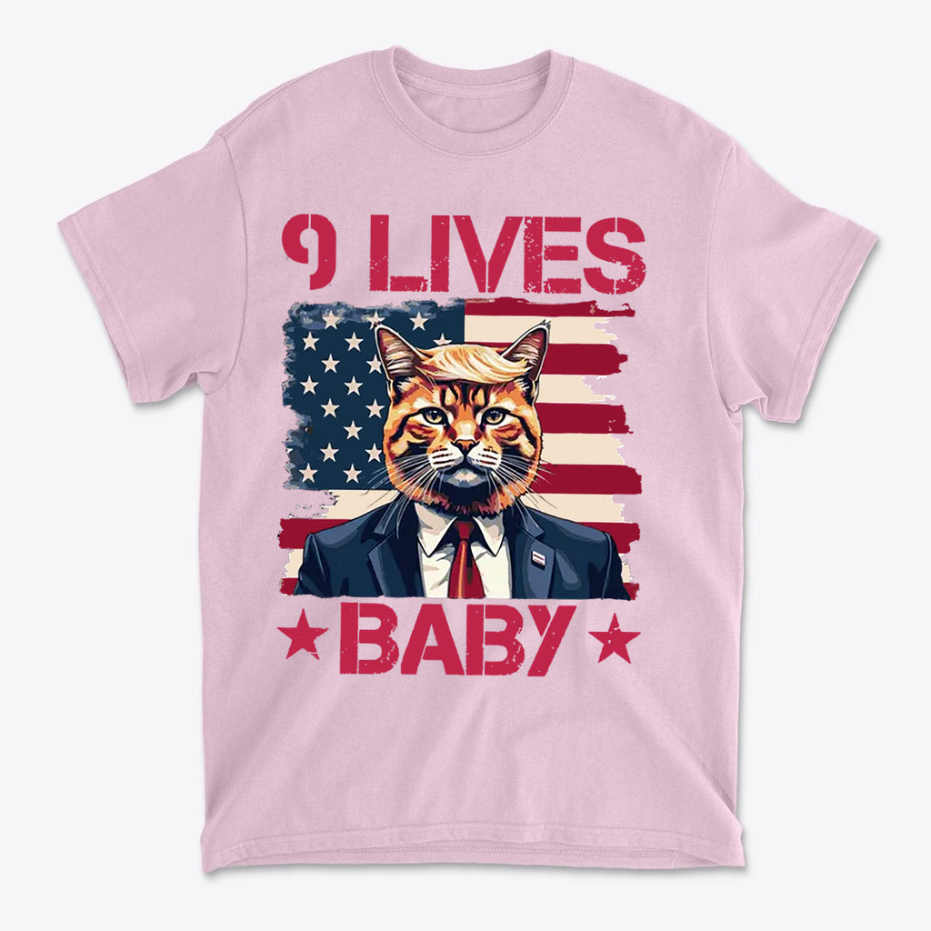 Nine Lives Baby Red Letters Art graphic tee featuring a cat in a suit against an American flag background.