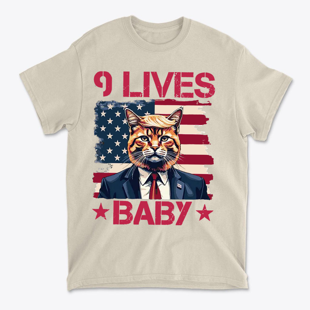 Nine Lives Baby Red Letters Art graphic tee featuring a cat in a suit with an American flag background.