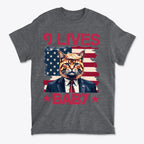 Nine Lives Baby Red Letters Art graphic tee featuring a cat in a suit on an American flag background.