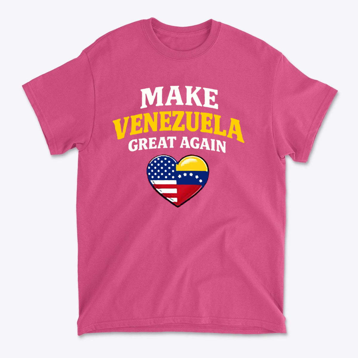 Make Venezuela Great Again With Flag Heart graphic tee on a pink shirt featuring patriotic symbols.