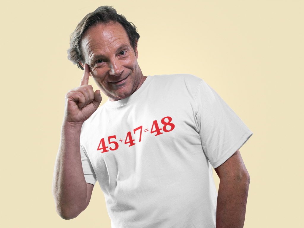 Man wearing a 45 Plus 47 Equals 48 Red Letters graphic tee showcasing personal values and patriotism.