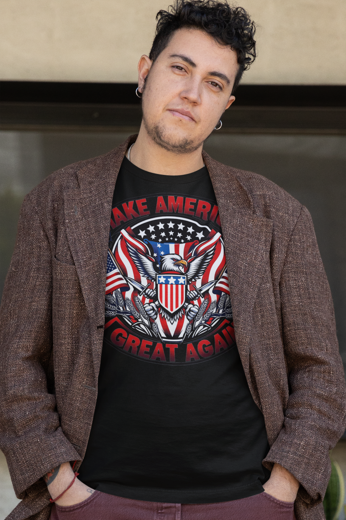Make America Great Again On Eagle graphic t-shirt worn by a man outdoors.