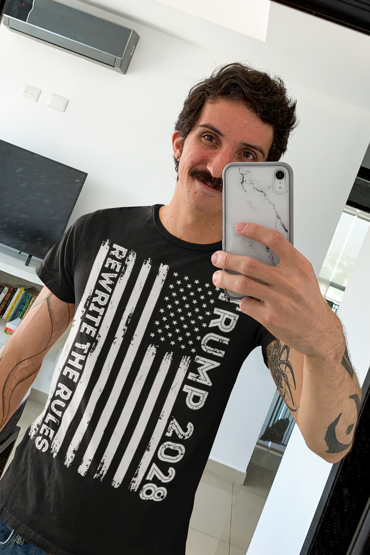 Man wearing a black t-shirt featuring the Trump 2028 Rewrite The Rules On Vertical American Flag design.