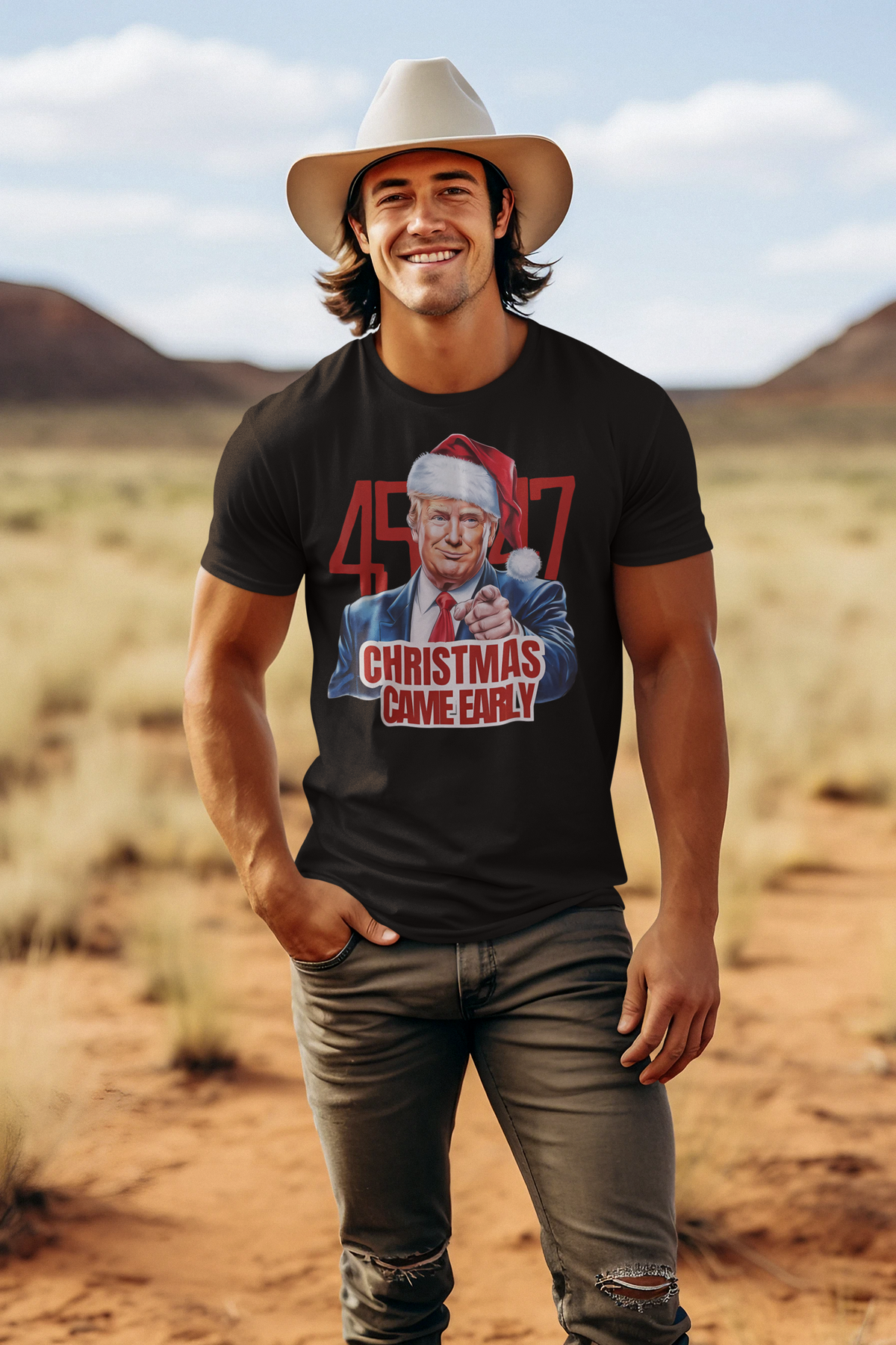 A smiling man wears the Christmas Came Early 45 47 Gear graphic t-shirt in a desert setting.