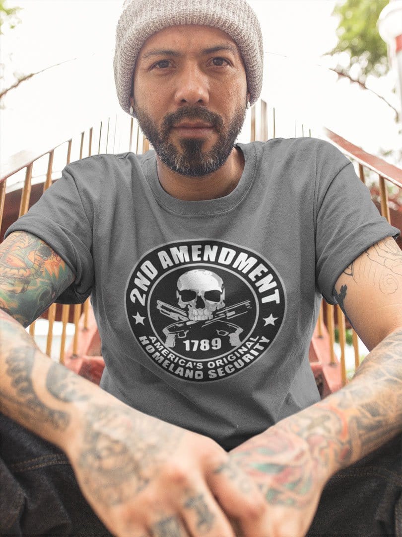 Man wearing 2nd Amendment 1789 America's Original Homeland Security t-shirt sitting on steps