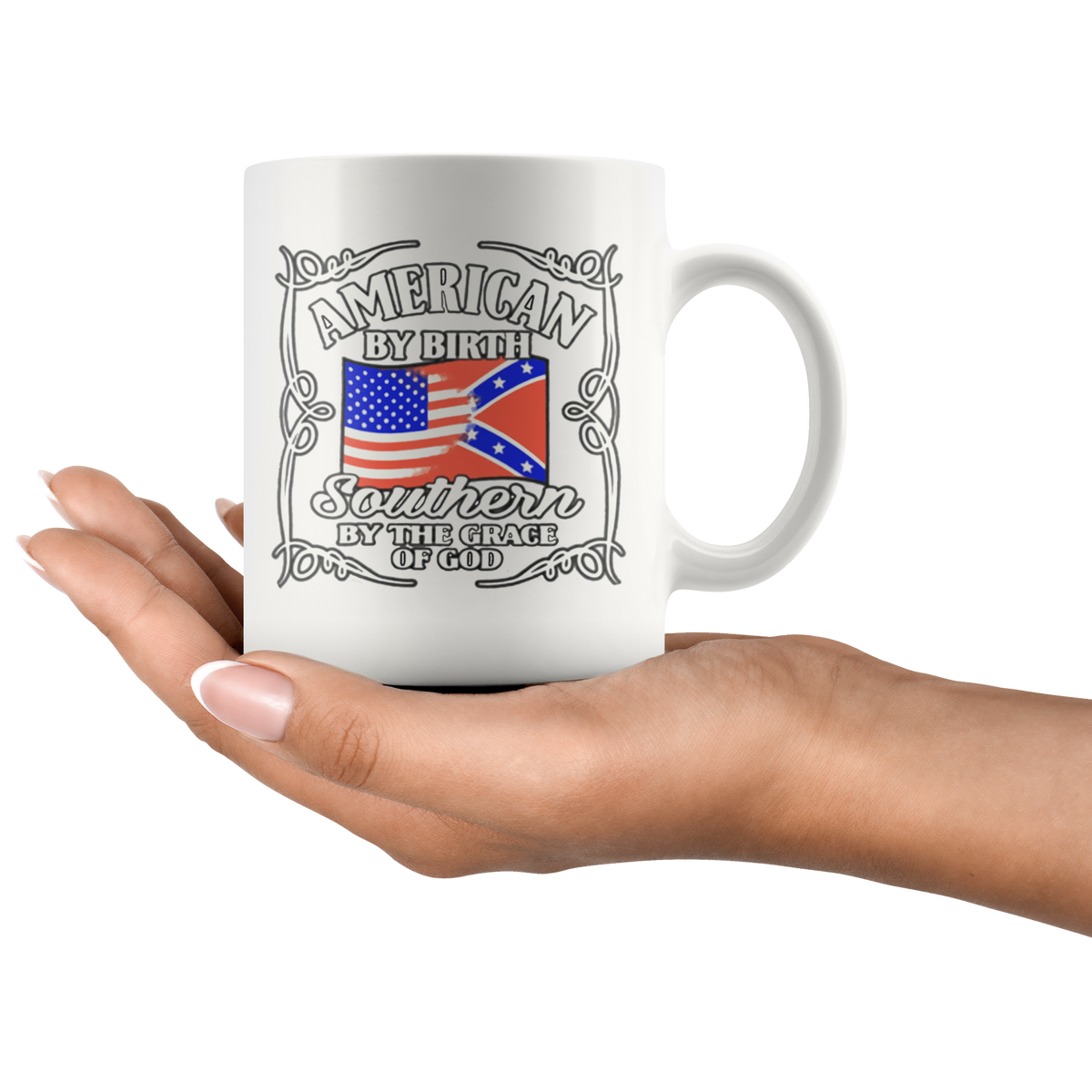 "American By Birth Southern By The Grace Of God Wht" mug with patriotic and Southern heritage design held in hand.