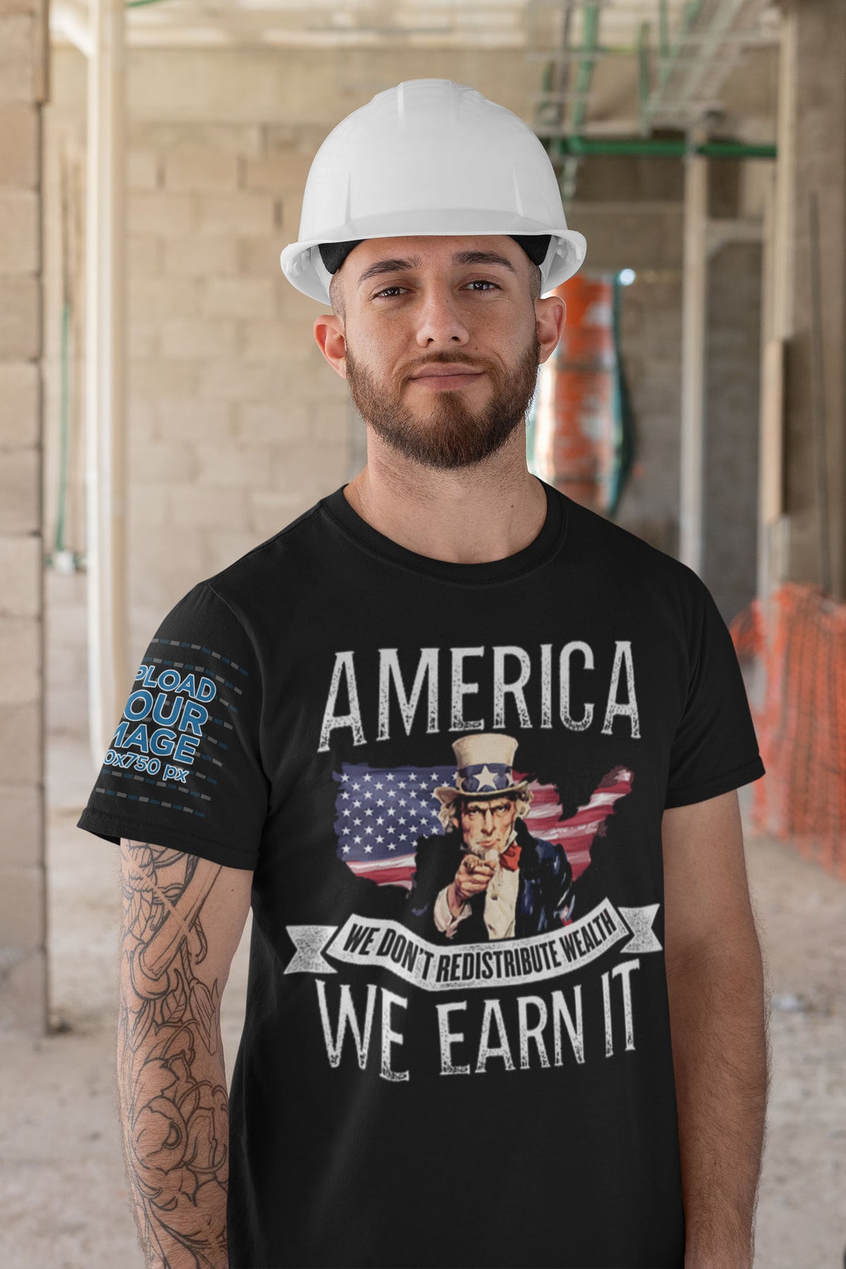 Man wearing 'We Earn It America Statement Shirt' with patriotic design on construction site