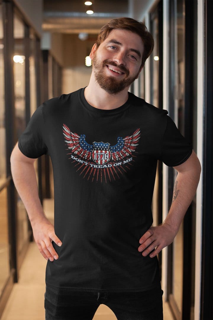 Man wearing Don't Tread On Me 1776 On American Flag Eagle t-shirt in casual setting