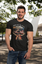 Man wearing Home Of The Free Because Of The Brave t-shirt with Americana motifs
