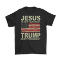 Black T-shirt with Jesus Is My Savior Trump My President Design featuring American flag.