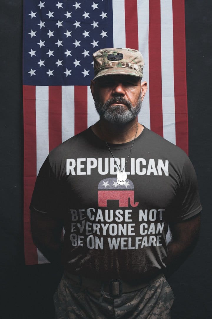 Man wearing Republican Because Not Everyone Can Be On Welfare shirt in front of American flag