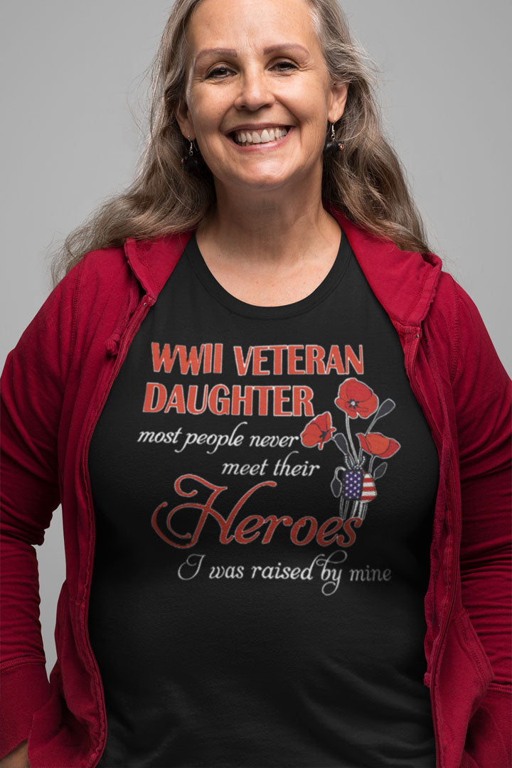 Woman wearing WWII Veteran Daughter Raised by My Hero Design t-shirt with red cardigan.