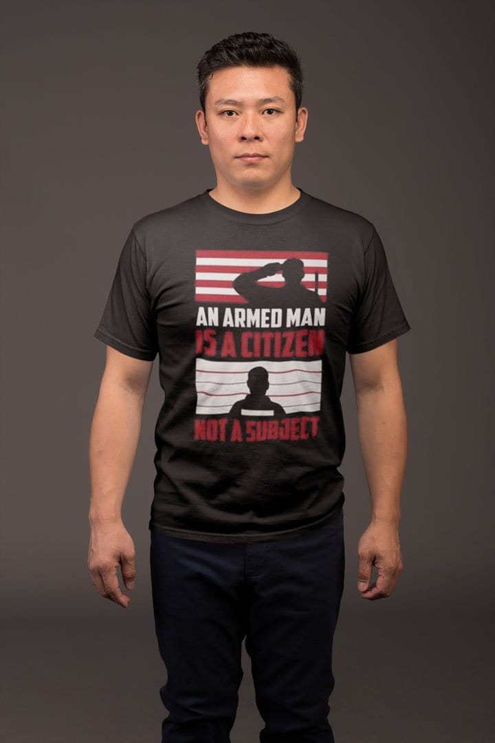 Man wearing 'An Armed Man Is A Citizen Not A Subject' graphic tee promoting individual liberty and rights.