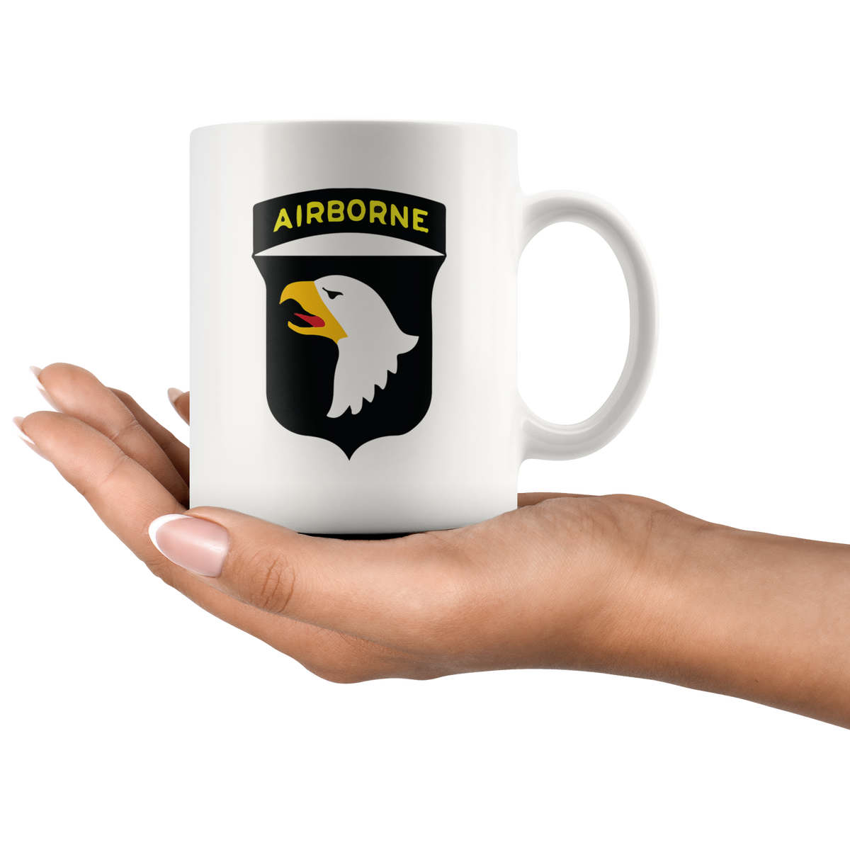 Hand holding a mug with Airborne Eagle Symbol Patriotic Graphic design