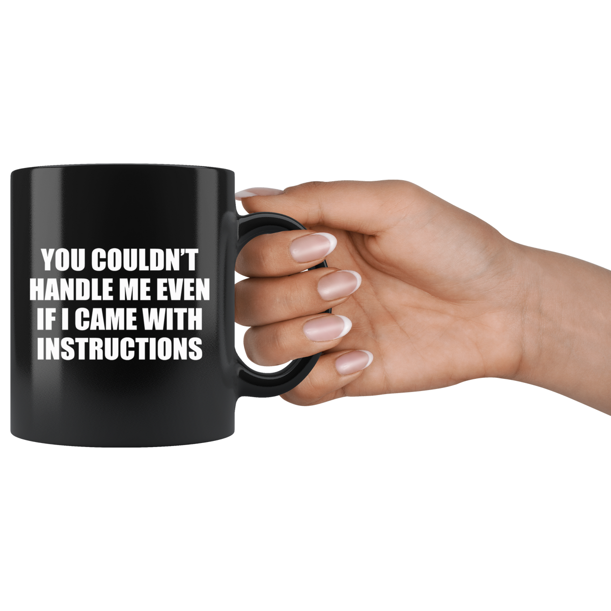 Black mug with "You Couldn't Handle Me Even If I Came With Instructions" text, held by hand, suitable for hot and cold beverages.